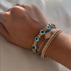 Evil eye and gold bracelet